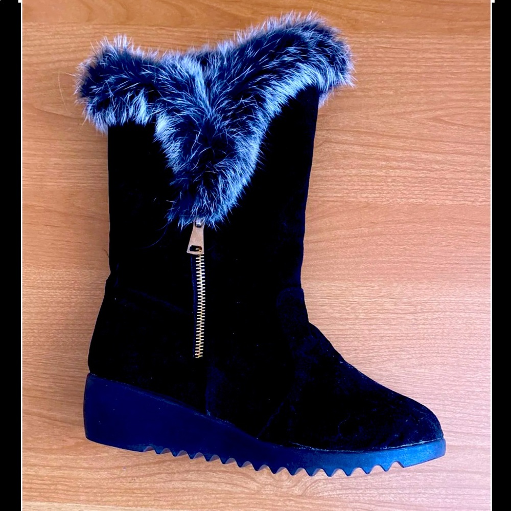 Black boots.  Synthetic suede.